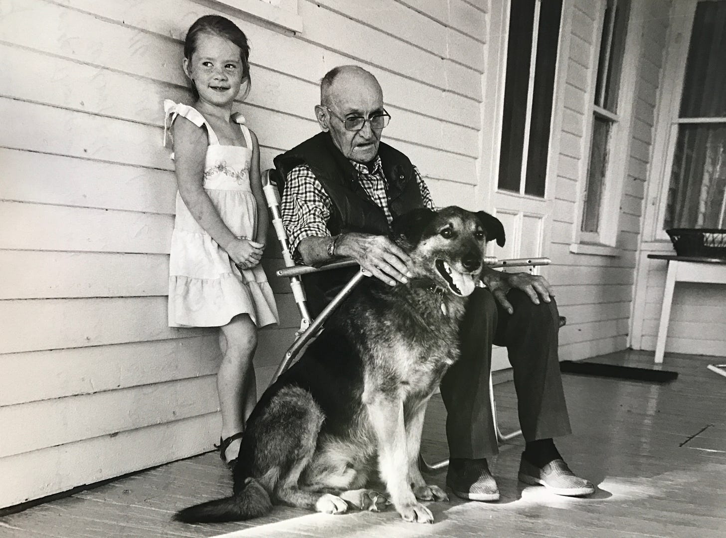 Black and white photo of Mary, Great uncle and dog