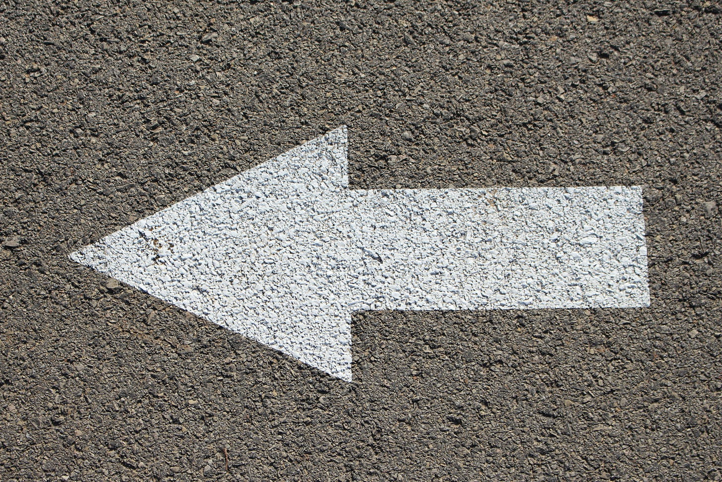 A photo of an arrow pointing to the left