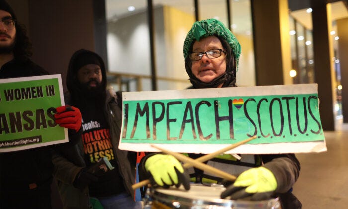 Pro-choice activists protest at the federal building plaza on Dec. 1, 2022, in Chicago. (TNS)