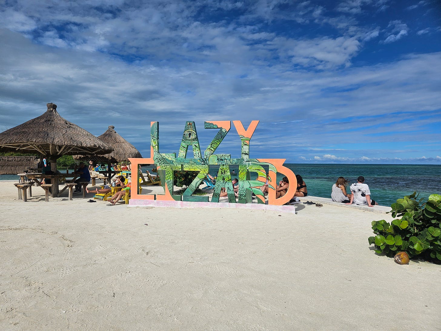 The Lazy Lizard is one of the bars on Caye Caulkner