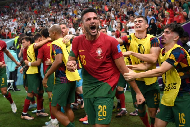 Goncalo Ramos of Portugal celebrates after scoring the team's first goal during the FIFA World Cup Qatar 2022 Round of 16 match between Portugal and...