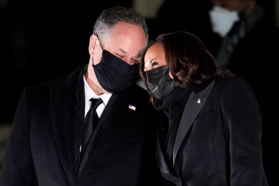 Kamala Harris and Doug Emhoff kiss with masks on despite being vaccinated