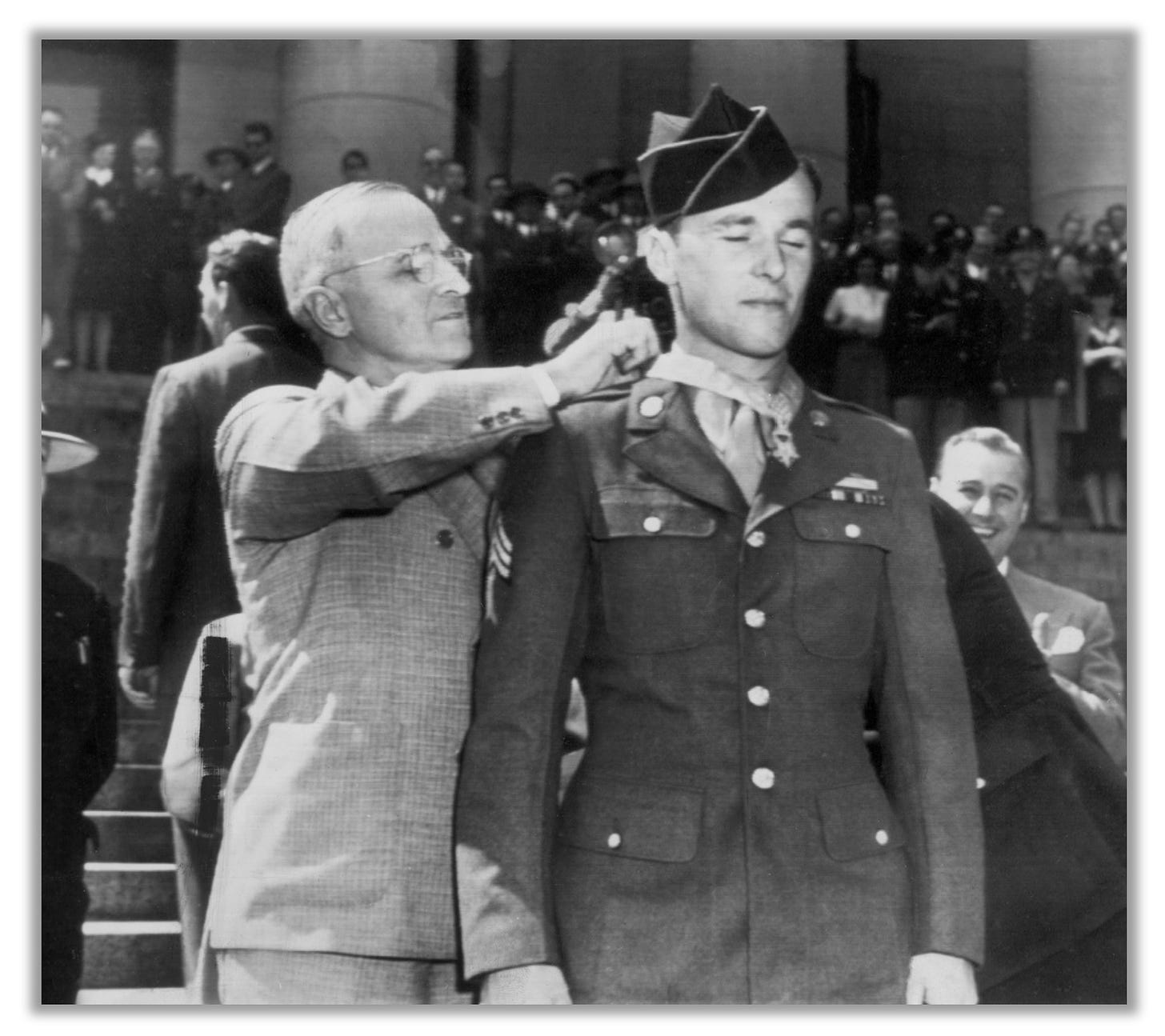 Truman presents John Hawk with his Medal of Honor