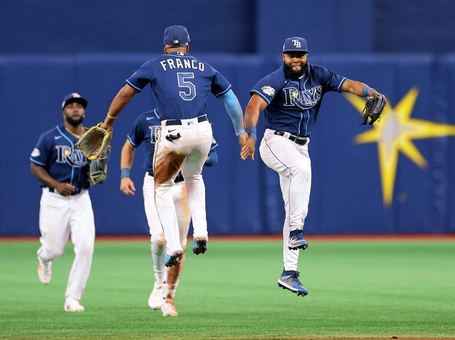 Wander Franco and Manuel Margot of the Tampa Bay Rays celebrate