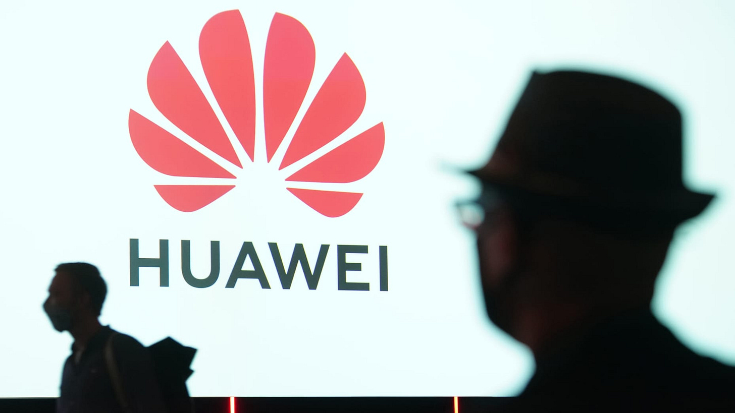 BERLIN, GERMANY - SEPTEMBER 03: People arrive to attend the Huawei keynote address at the IFA 2020 Special Edition consumer electronics and appliances trade fair on the fair's opening day on September 03, 2020 in Berlin, Germany. The fair is taking place despite the ongoing coronavirus pandemic, albeit in a reduced form and without personal access for the general public. The IFA 2020 Special Edition will take place from September 3-5. (Photo by Sean Gallup/Getty Images)