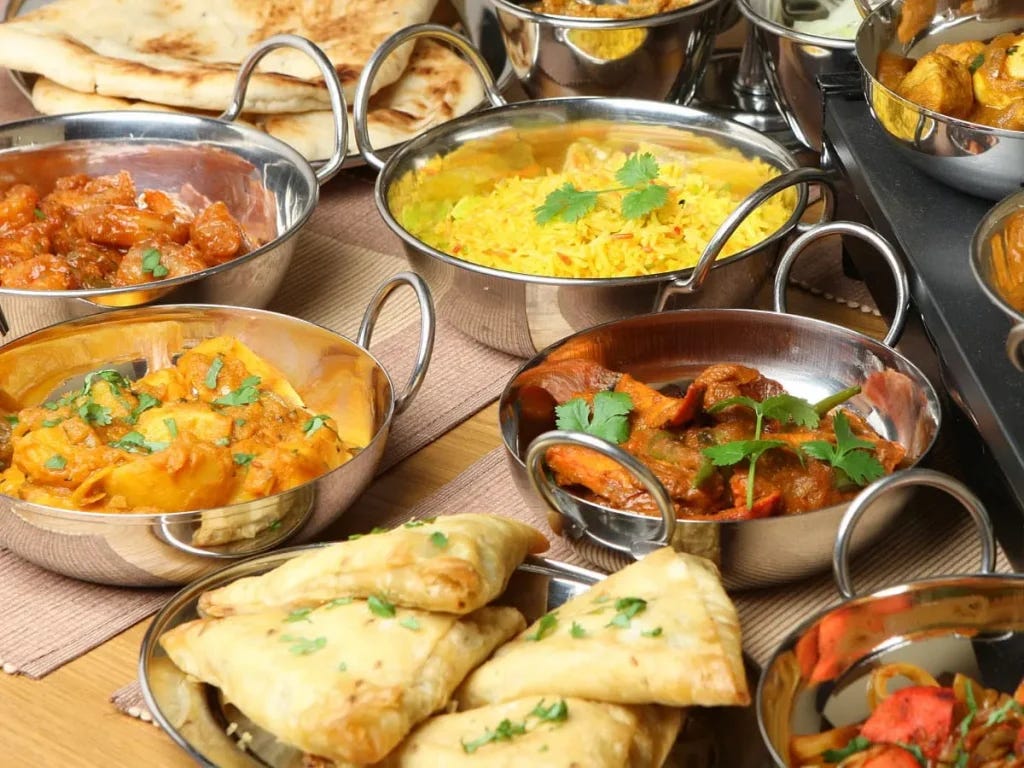 From Curries to Fish and Chips: Unveiling the Flavors of Famous British  Indian Cuisine