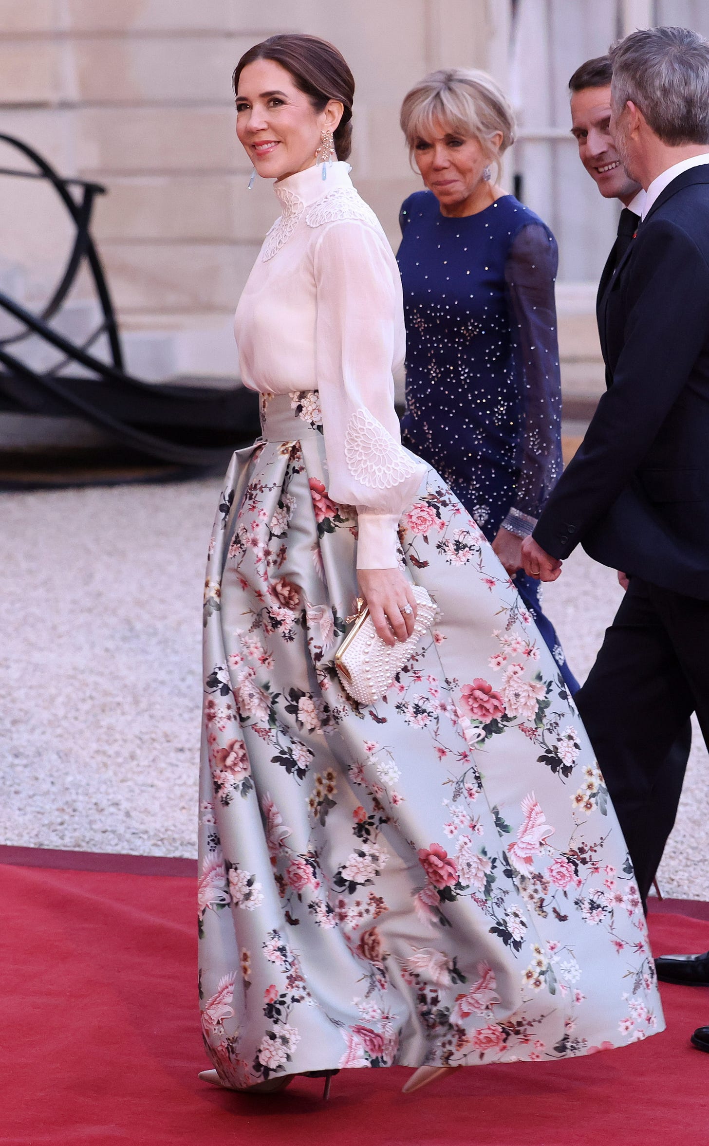 queen mary of denmark wearing a floral maxi skirt