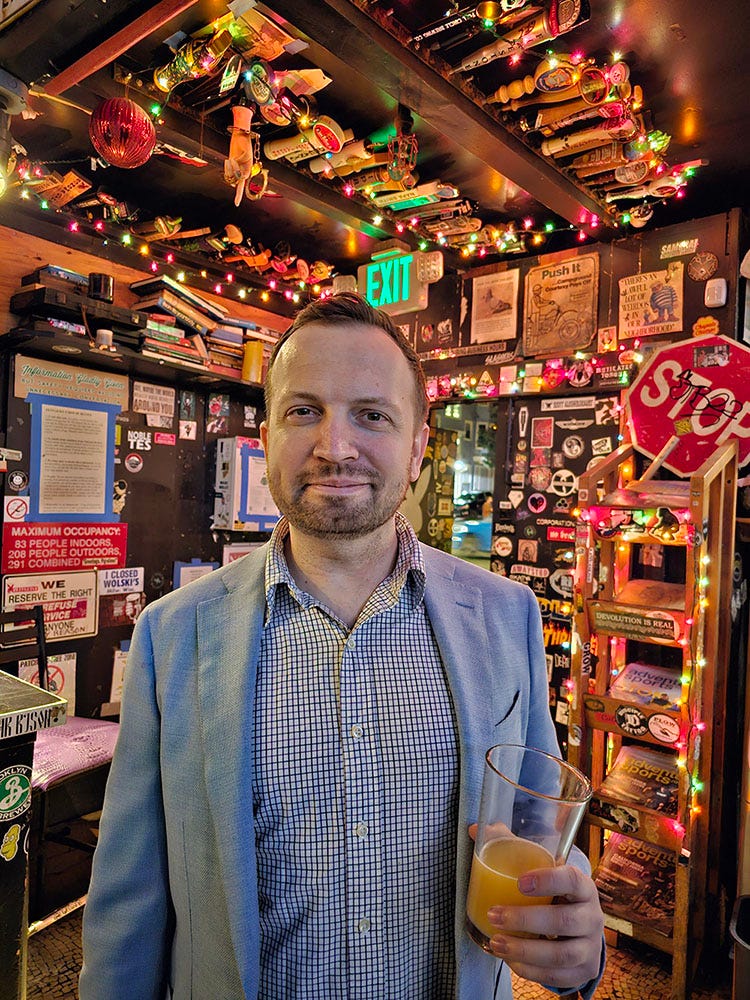 Matt Swider in a suit at a bar using the Samsung Galaxy S23 Ultra camera