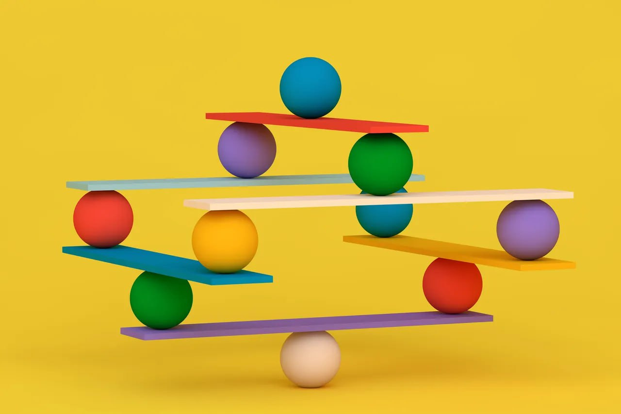 Estructura vertical formada con bolas y reglas que conservan un equilibrio muy delicado.