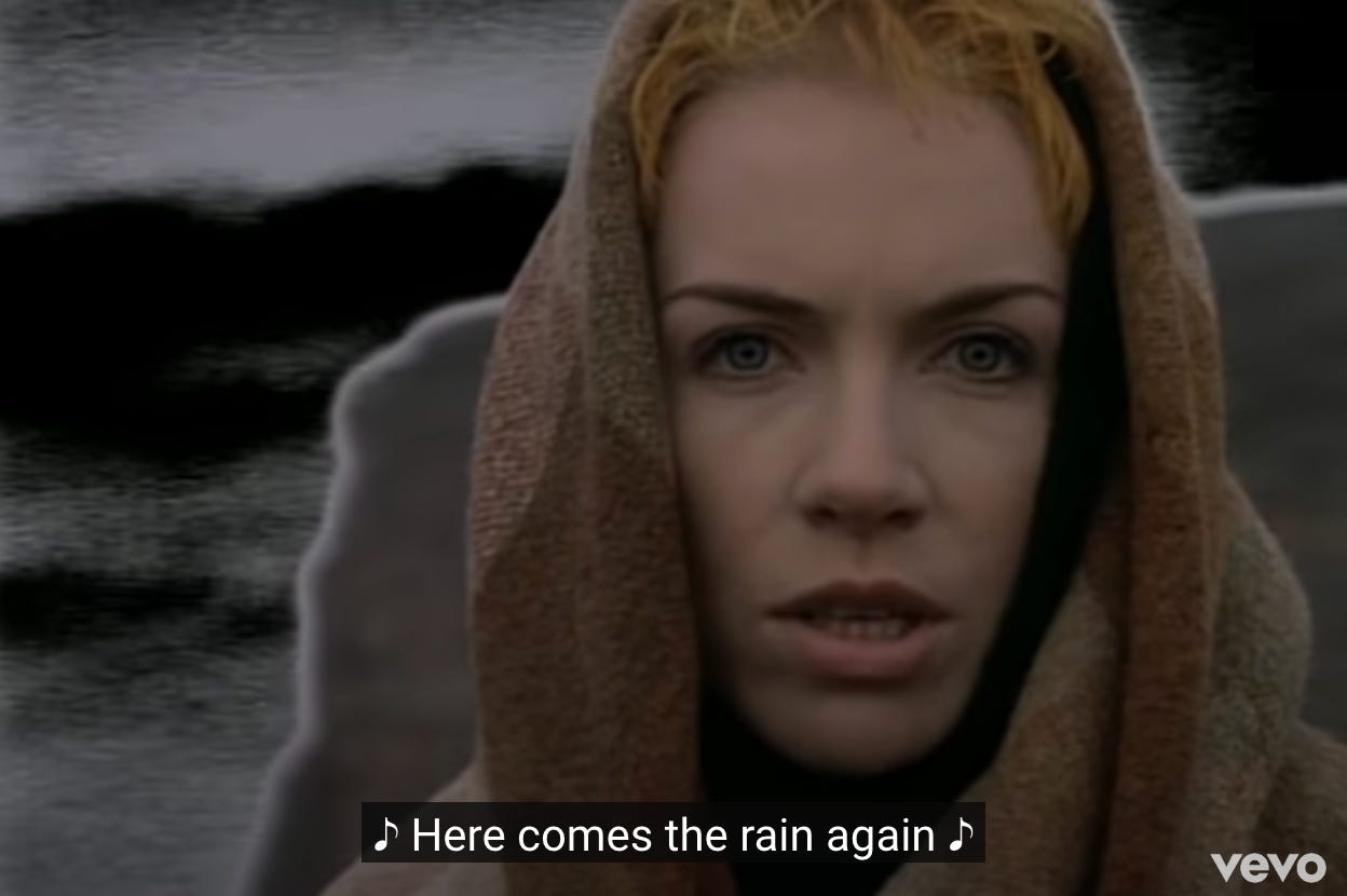 Annie Lennox singing "Here comes the rain again"