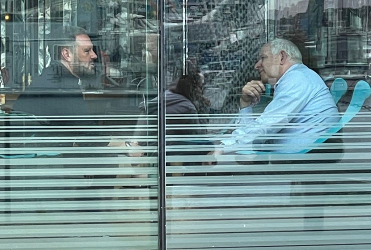 Papped photo of Mark Ashton and Ed Schwartz in the window of the Salthouse Hotel