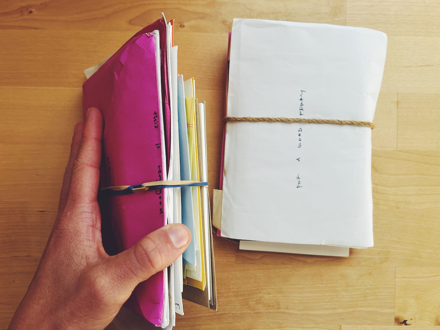 A photo of a stack of letters, held together by twine