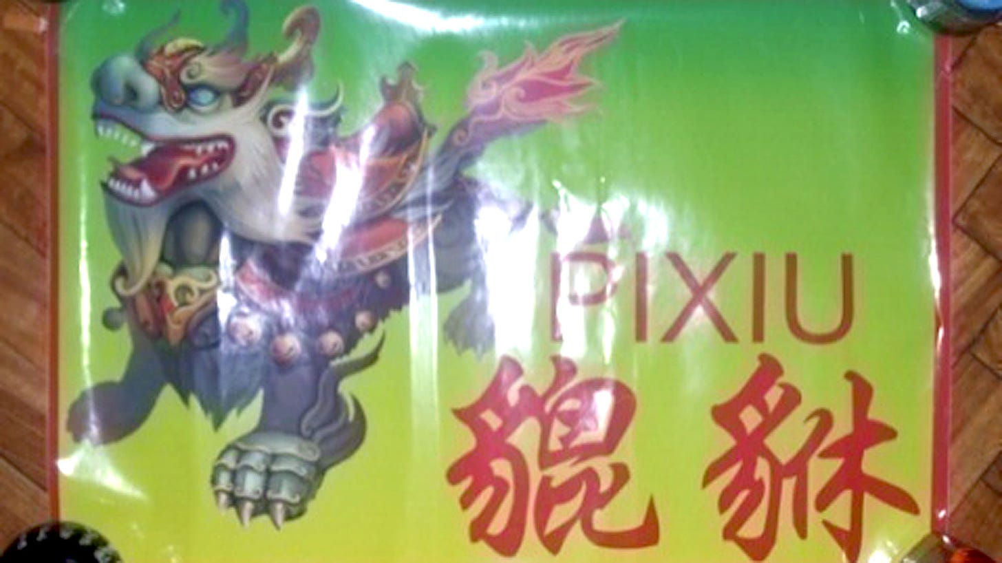 Sticker of the Pixiu clan, visible in the supermarkets that extorted