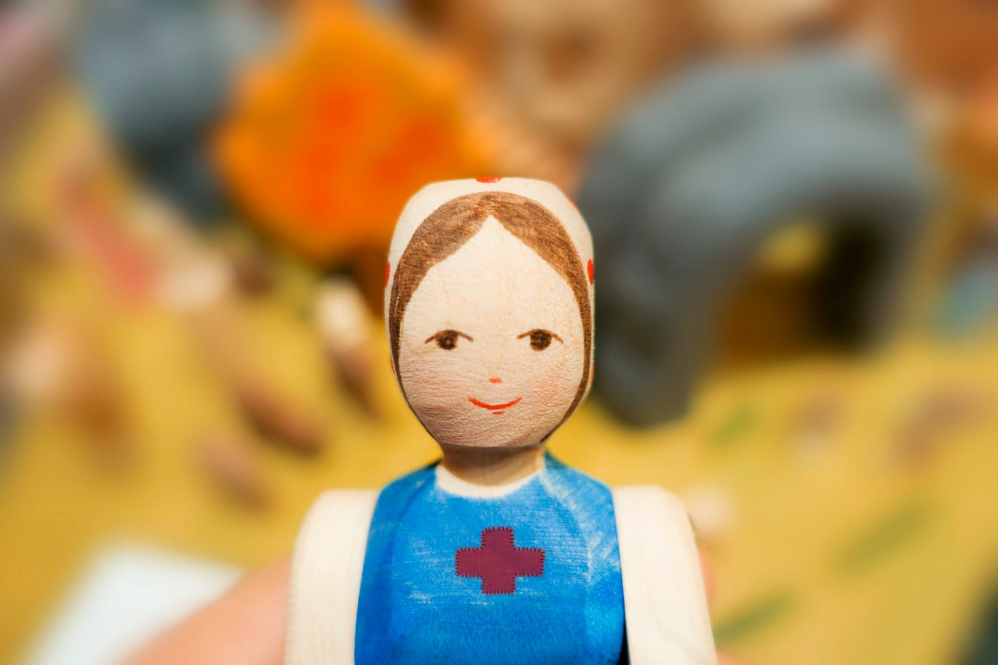 A toy wooden nurse.