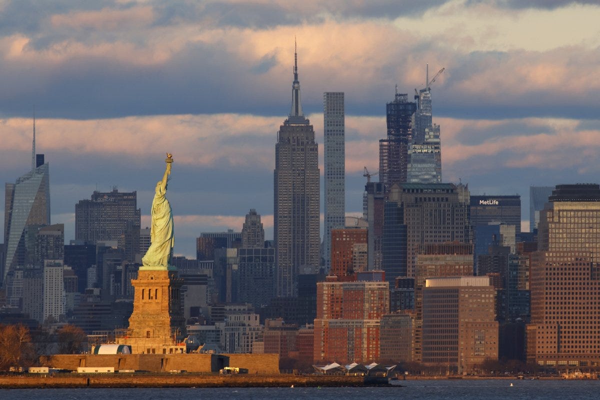 The sun sets on New York City The sun sets on New York City