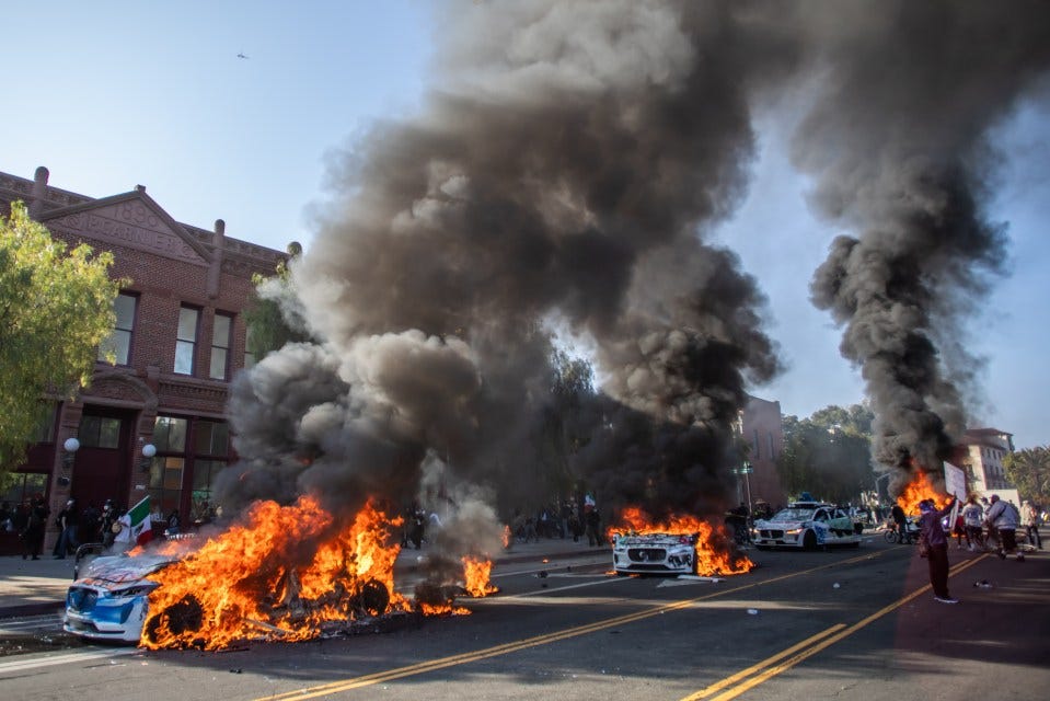 Burning cars during a protest in Los Angeles.