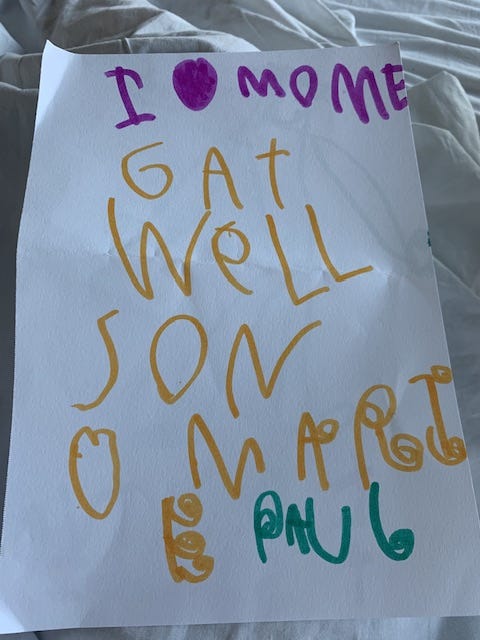 Kids' writing says I heart mommee gat well soon