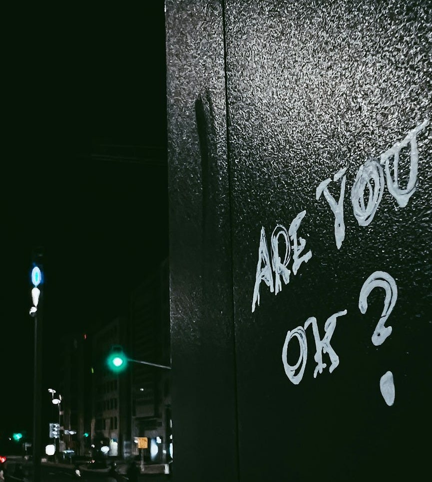 graffiti on the side of a building that says are you ok?