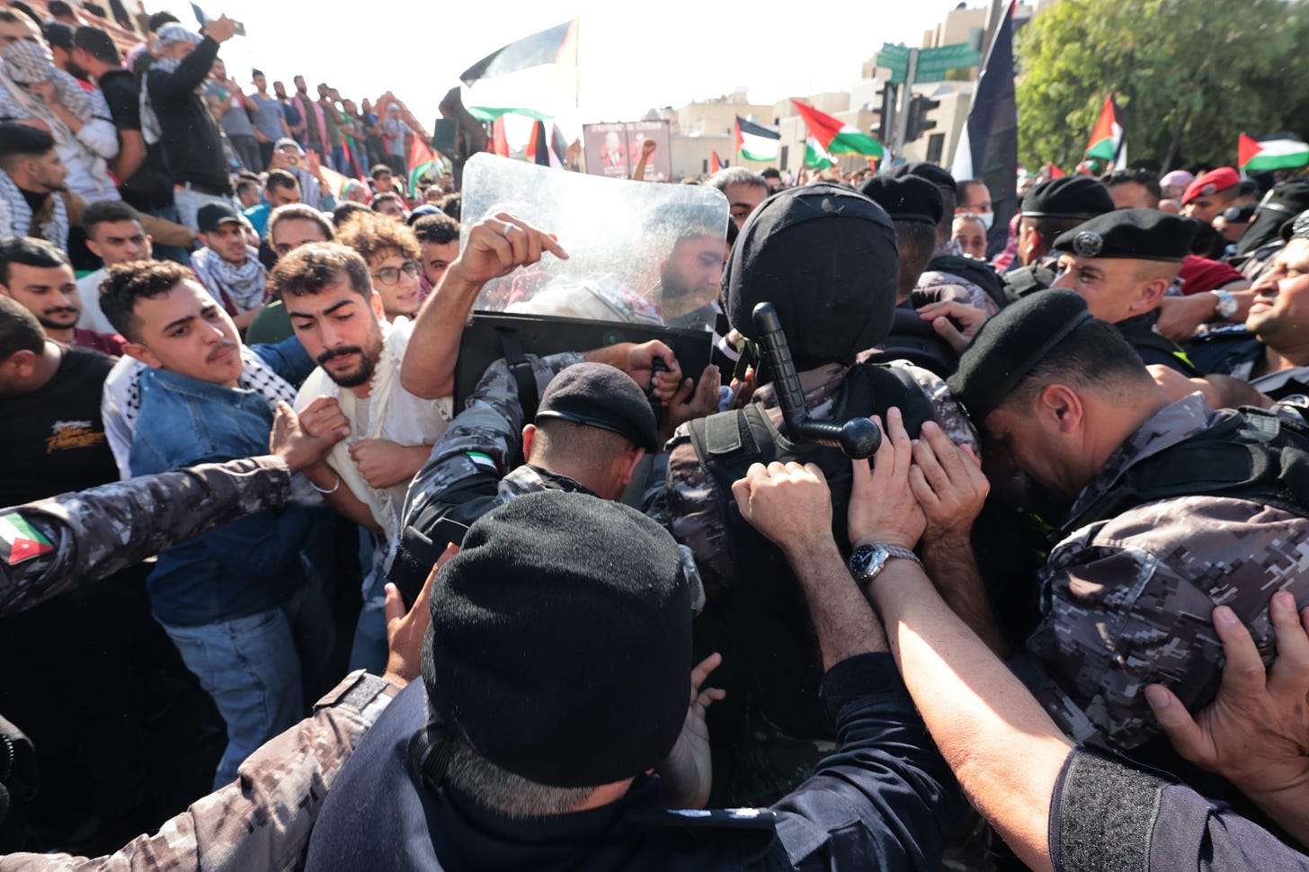 Jordan Says Several Public Security Members Injured in Riots Near Israel  Embassy - Bloomberg