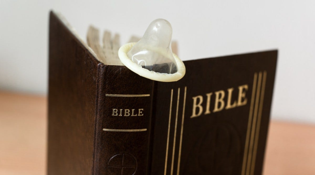 Survey: Catholics regularly ignore the Church's teachings on birth control | A condom atop a Bible
