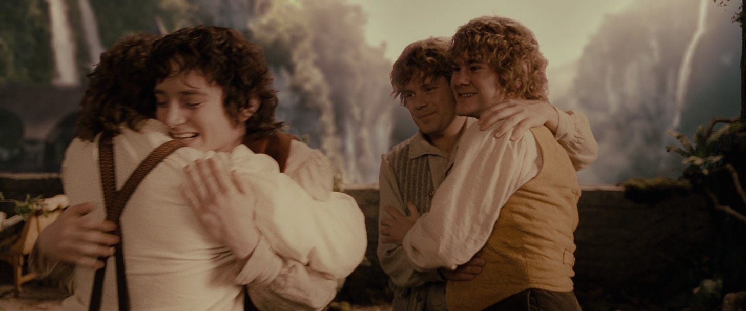 the hobbits embrace in Rivendell