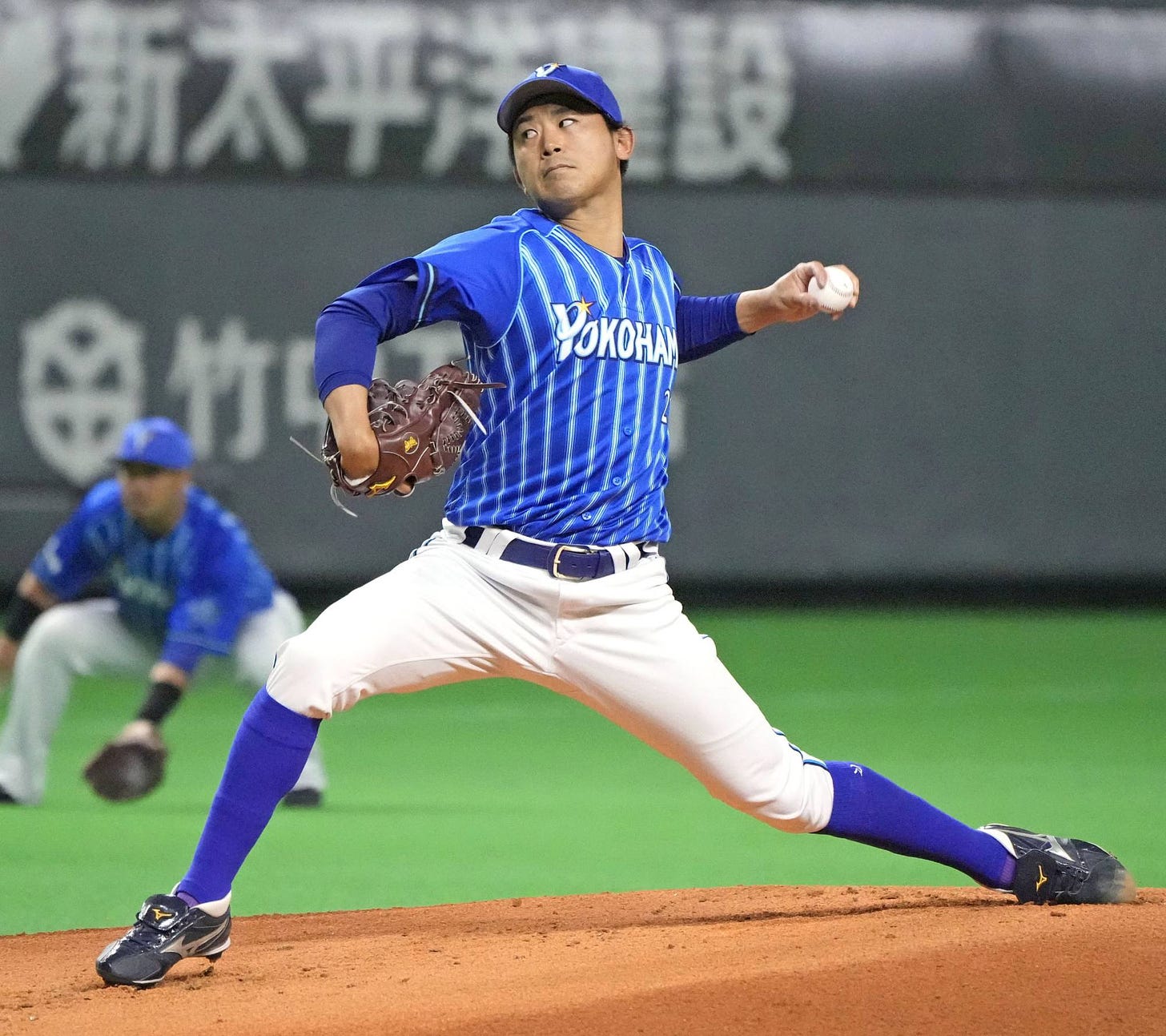 BayStars pitcher Shota Imanaga throws a pitch on his way to a no-hitter against the Nippon Ham Fighters in an interleague baseball game at Sapporo Dome on Tuesday. | KYODO