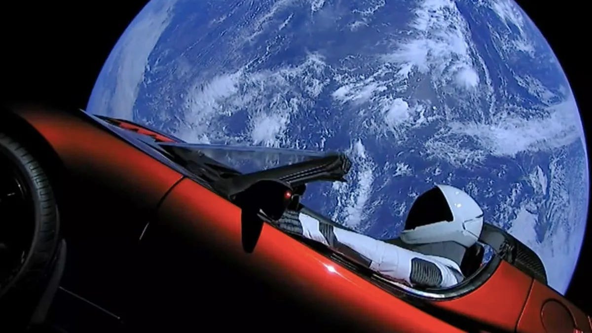 Tesla Roadster floating in Space.