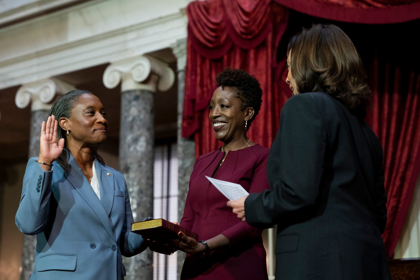 Vice President Kamala Harris, right, swears in Laphonza Butler, D-Calif., left, to the Senate to succeed the late Sen. Dianne Feinstein during a re-enactment of the swearing-in ceremony on Tuesday, Oct. 3, 2023, on Capitol Hill in Washington. 