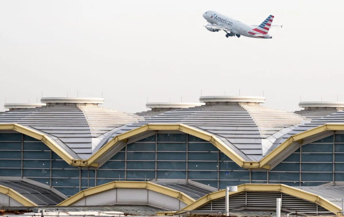 An American Airlines Airbus A319 airplane takes off past the terminal at Ronald Reagan Washington National Airport in Arlington, Va., on Jan. 11, 2023. (Saul Loeb/AFP via Getty Images)