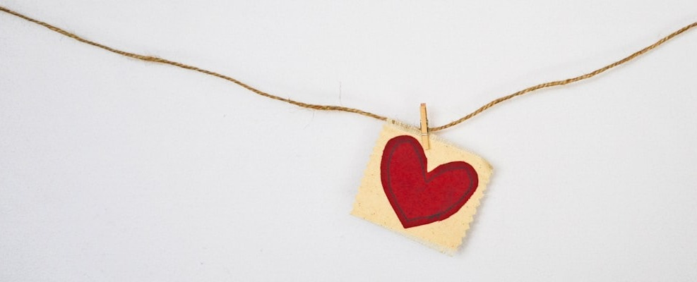heart-shaped red and beige pendant heart-shaped red and beige pendant