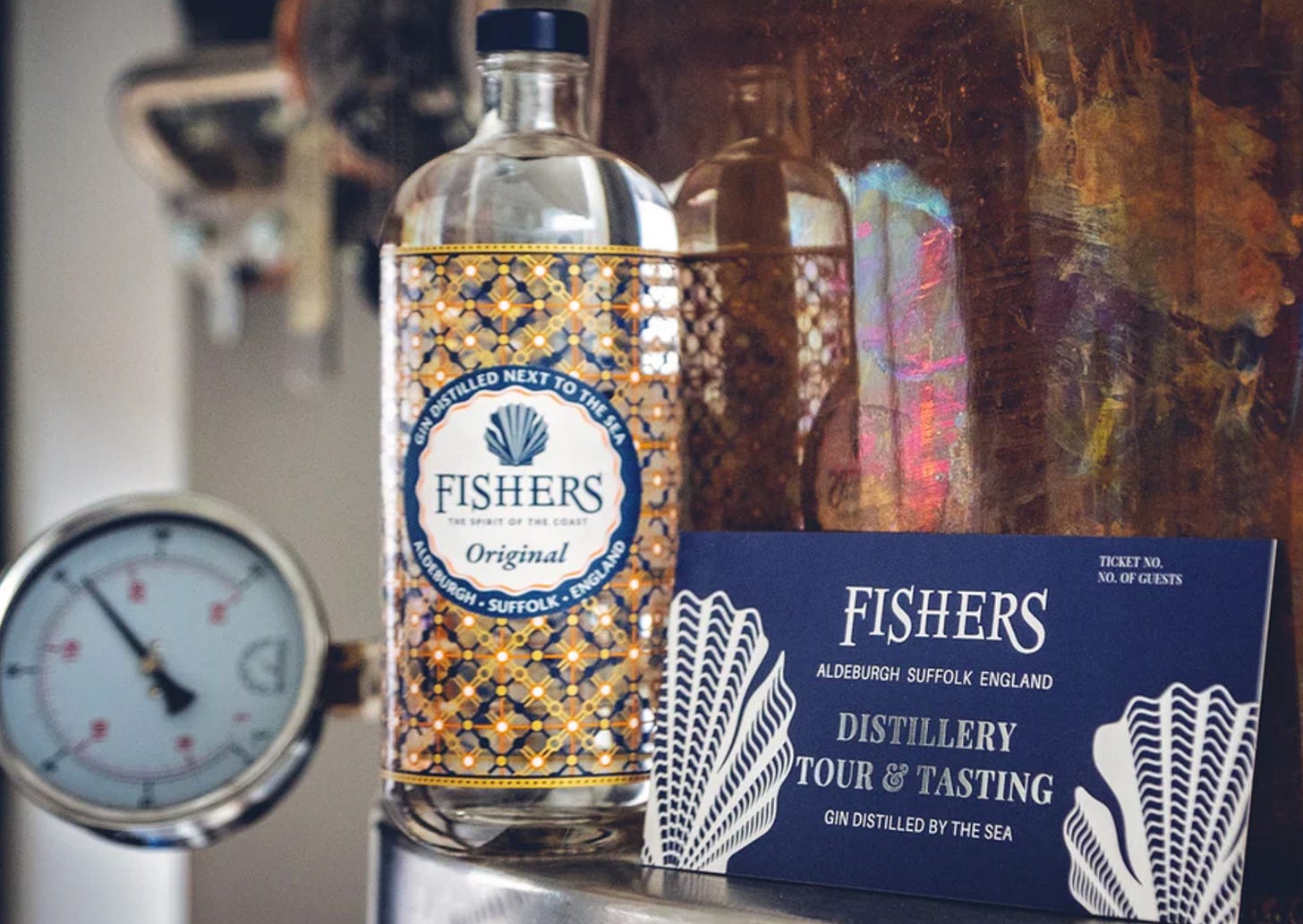 fishers gin bottle and voucher in a deep blue sleeve