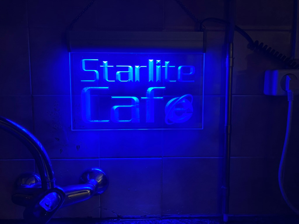 Neon Starlite Café sign