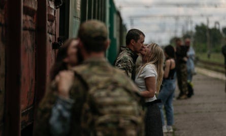 Relatives visit Ukrainian servicemen on leave near the frontline, May 2023.