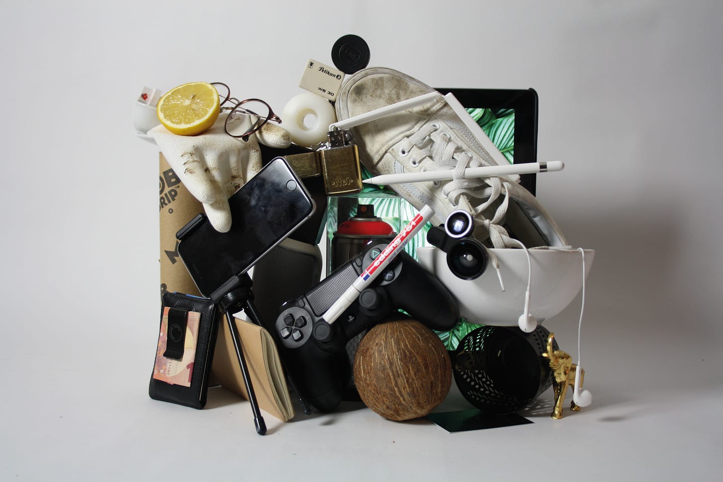 A photograph of a pile of unrelated objects, artfully arranged.
