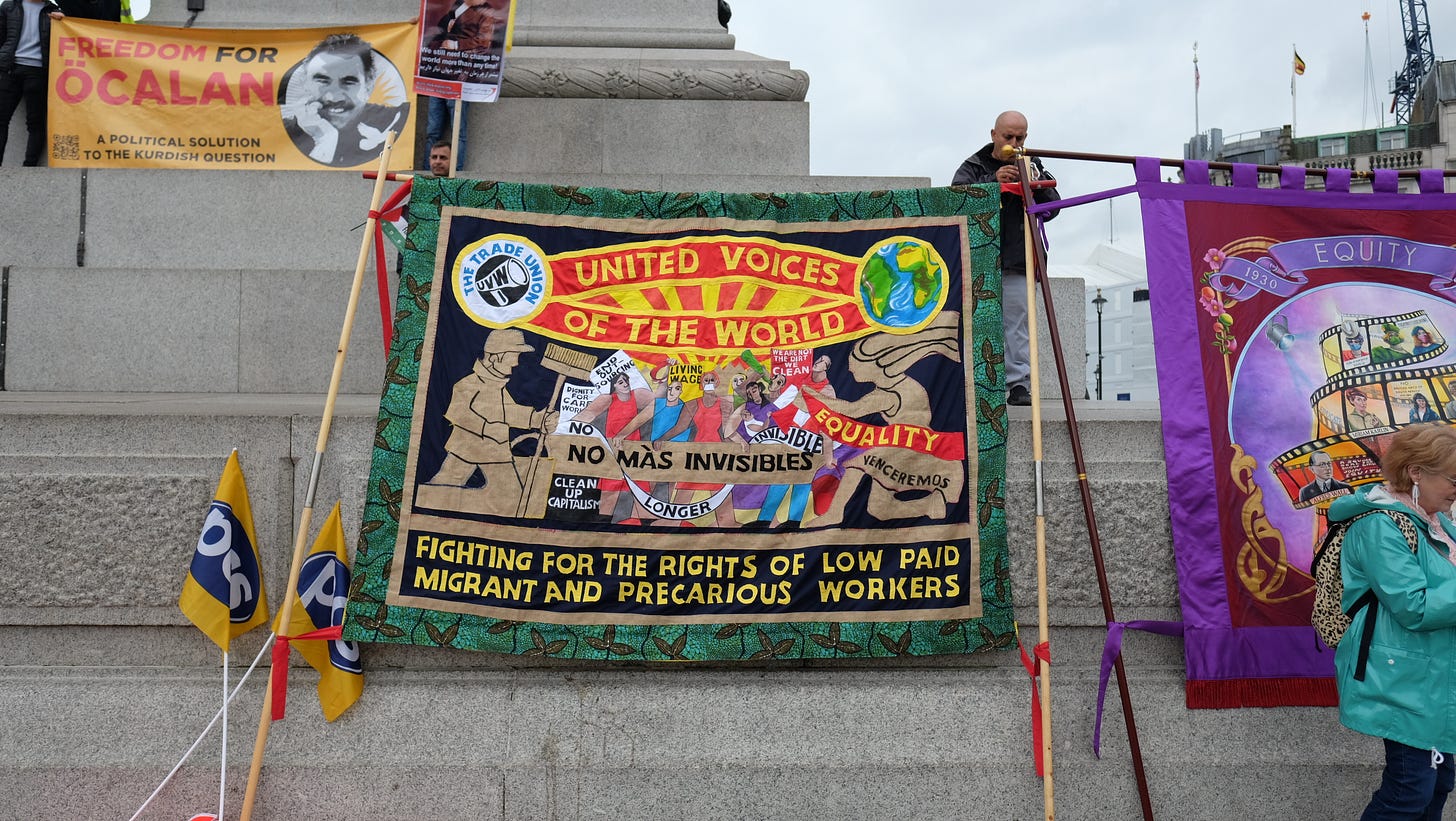 A banner promoting low paid immigrant workers