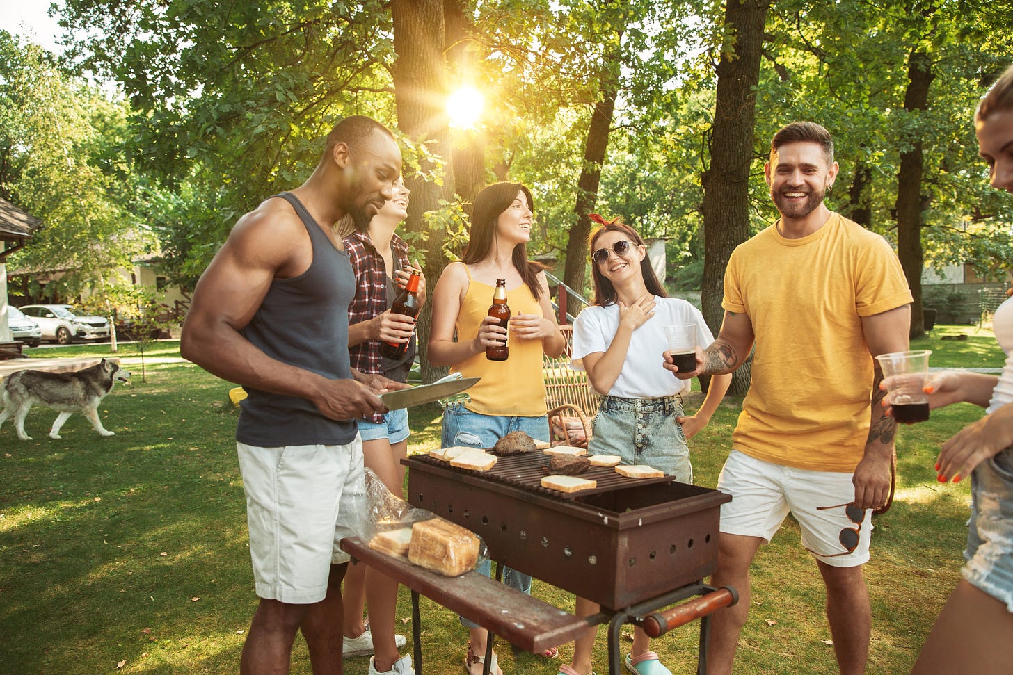 <a href="https://www.freepik.com/free-photo/group-happy-friends-having-beer-barbecue-party-sunny-day-resting-together-outdoor-forest-glade-backyard_12701254.htm#query=bbq%20party&position=0&from_view=search&track=ais">Image by master1305</a> on Freepik