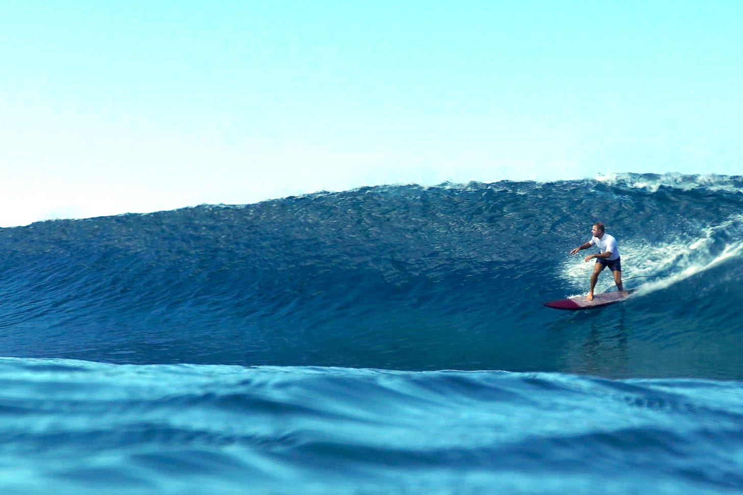 Picture of Nat Sharratt surfing in Puerto Rico. Thanksgiving 2024