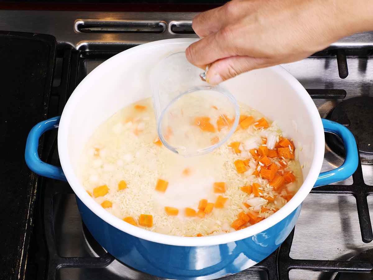 Cooking Rice on Stovetop Adding Water