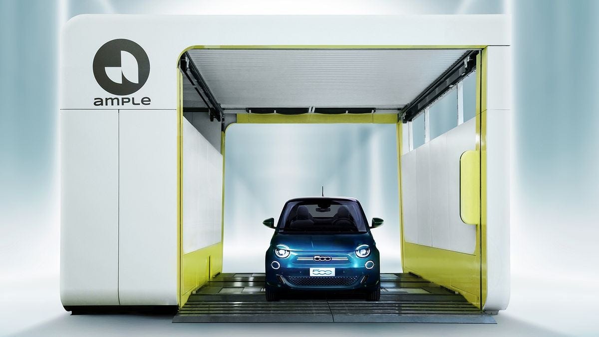 A Fiat 500e electric vehicle inside Ample&#x27;s battery swapping station.