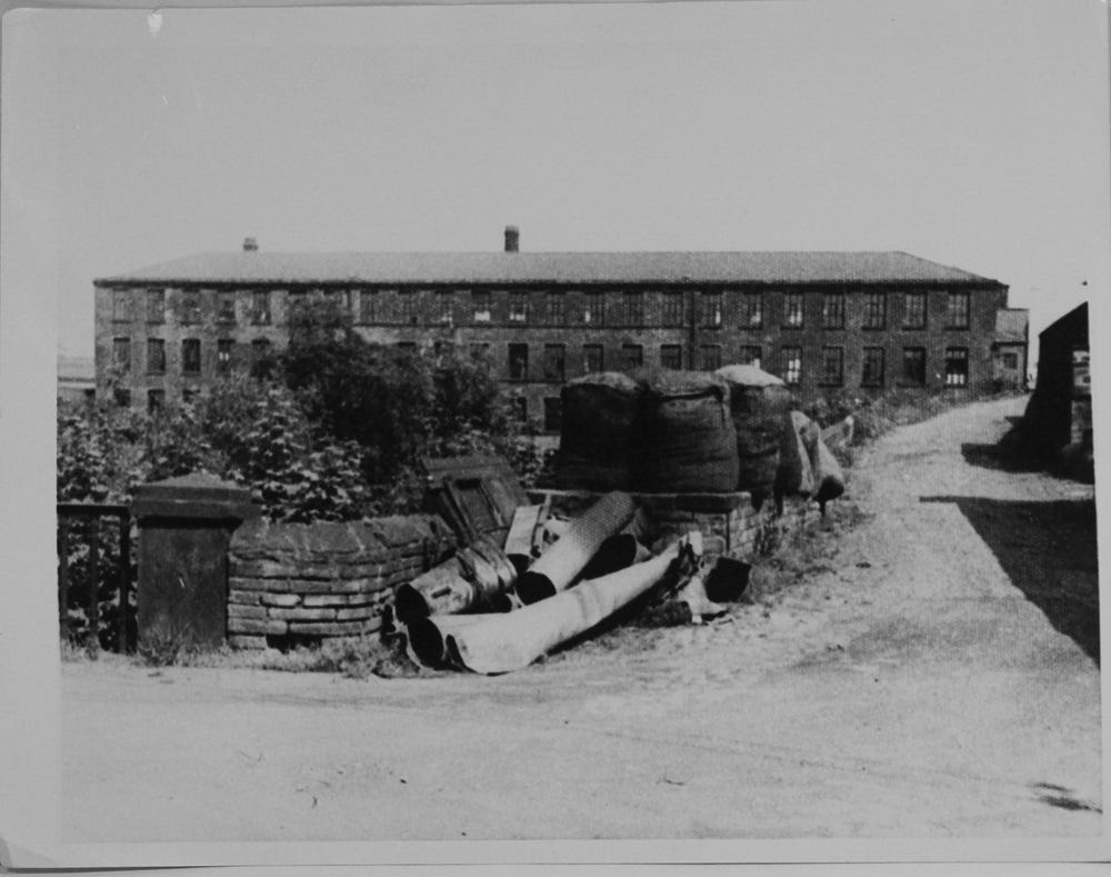 an old photo of Armley Mills circa 1950s