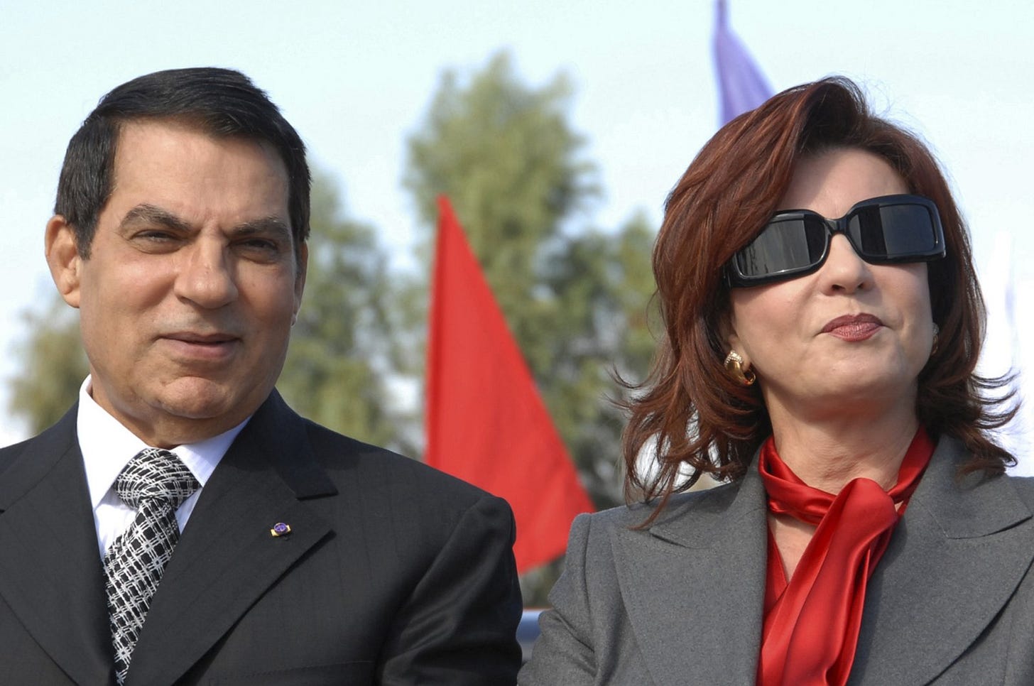 In this file photo, Tunisian President Zine EL Abidine Ben Ali and his wife, Leila, mark the 20th anniversary of Ben Ali's presidency, in Rades, outside Tunis, Nov. 7, 2007. (AP Photo)