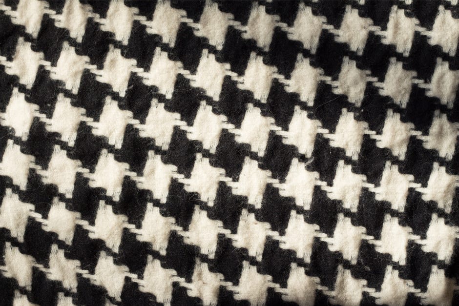 black and white houndstooth check fabric, an alternating jagged pattern