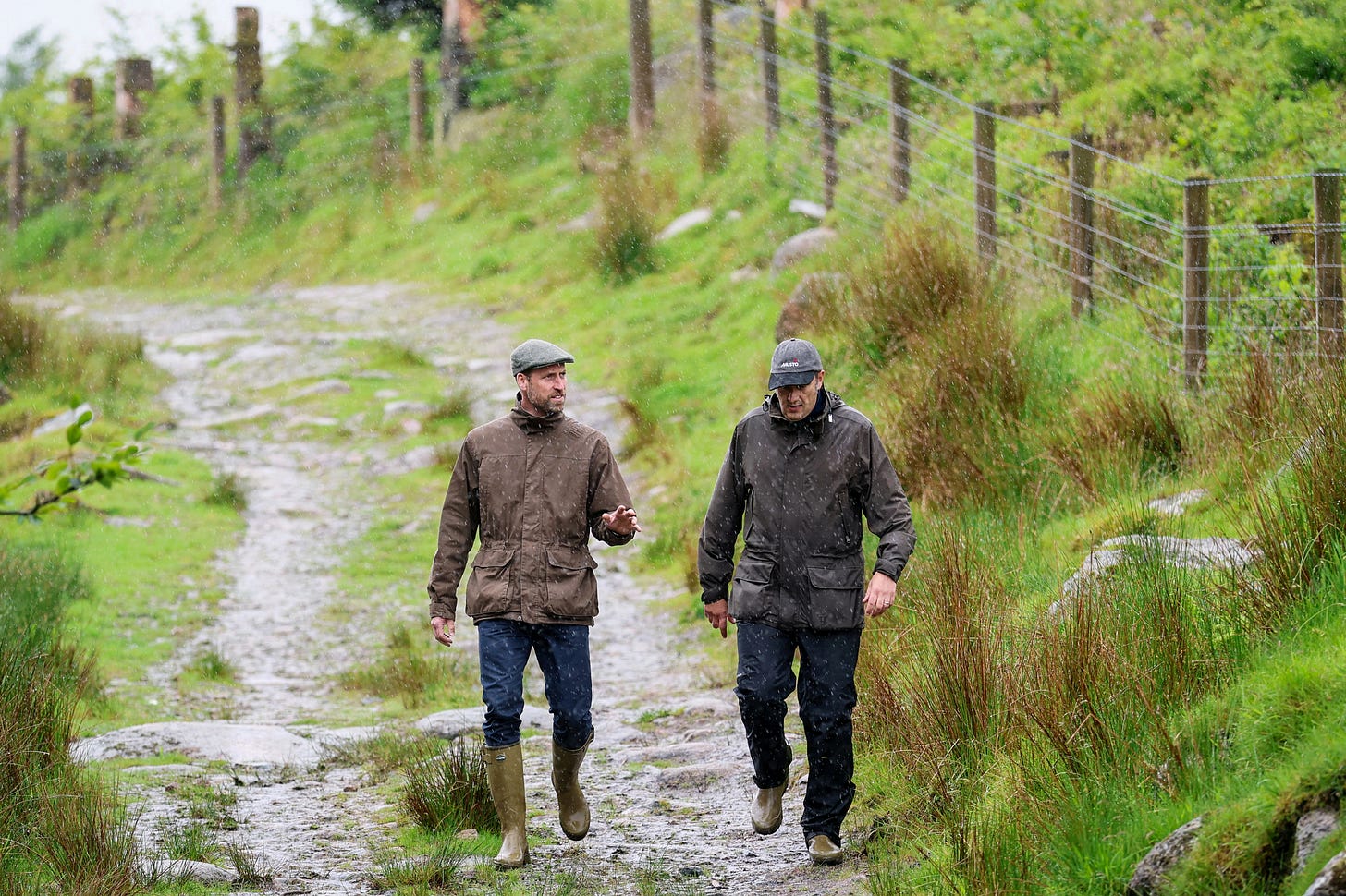 Prince William wearing wellies to walk through peatland