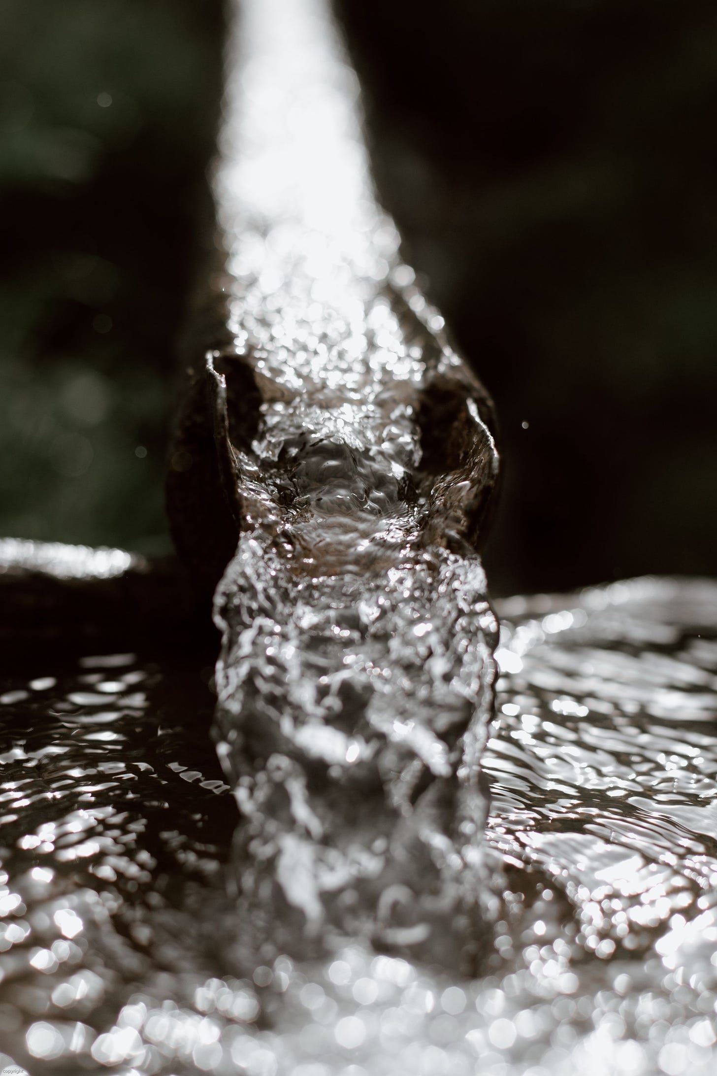 water flowing thru a half-pipe via Pexels