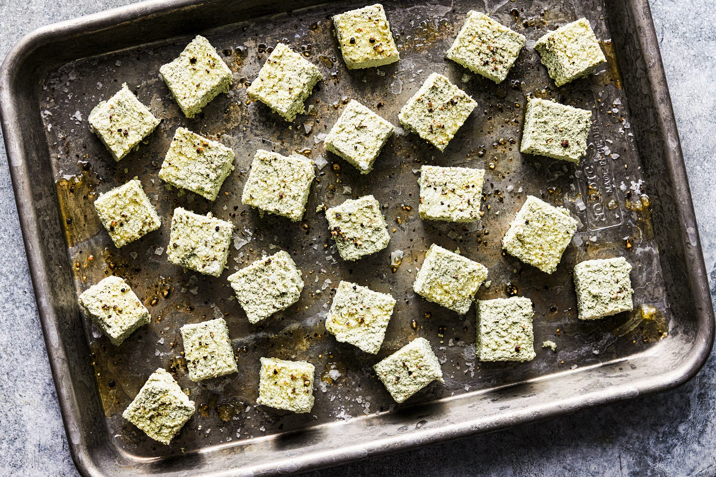 pumpkin seed tofu on a sheet pan