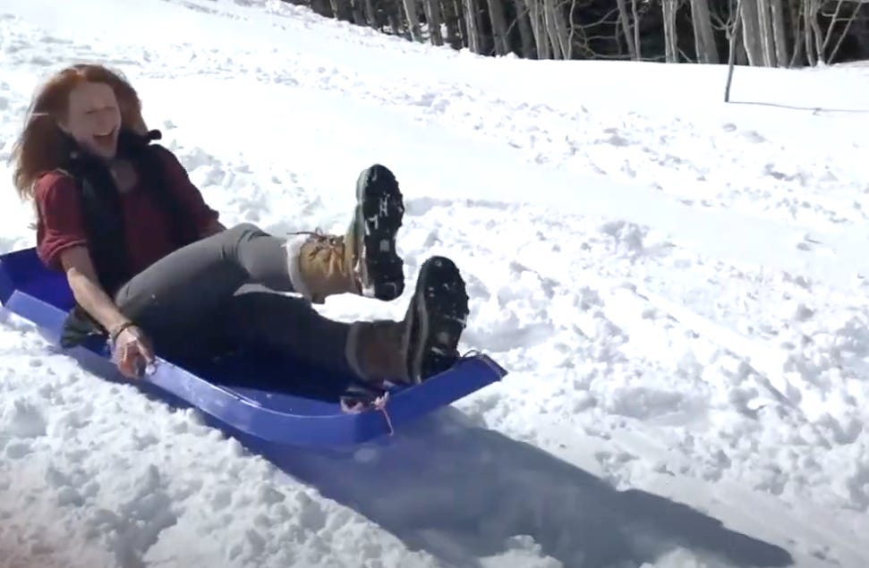 Tina Harlow riding snowboard