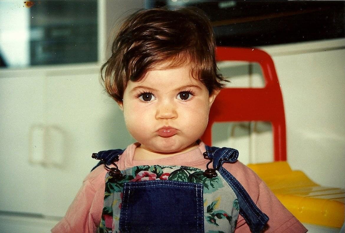 Camille as a chubby baby