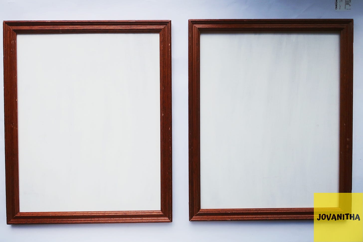 Two white wooden board in vintage frames