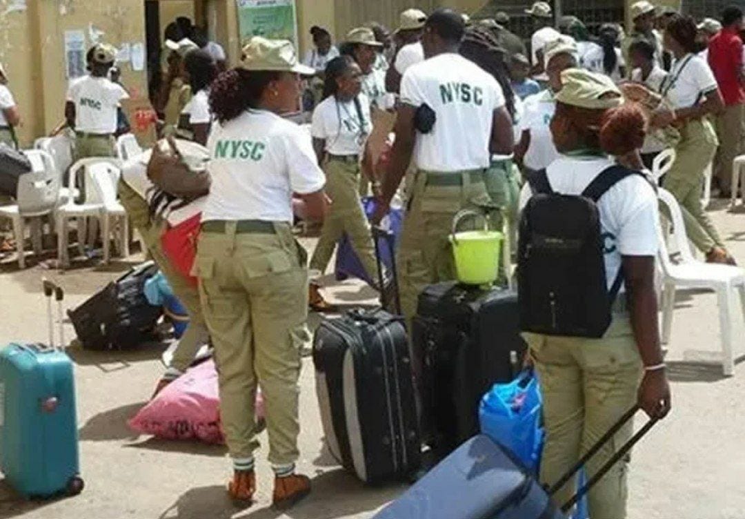 Corps members in camp