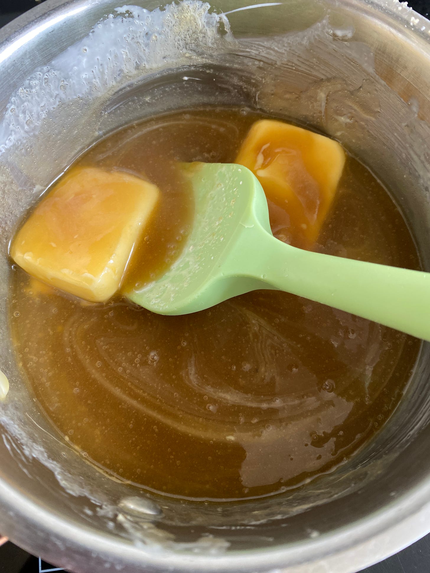 Toffee Sauce ingredients bubbling in a pan.